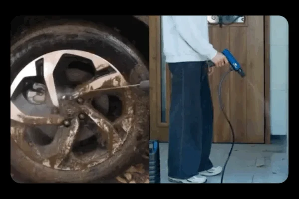 泥だらけの車のホイールを高圧洗浄機で清掃する様子