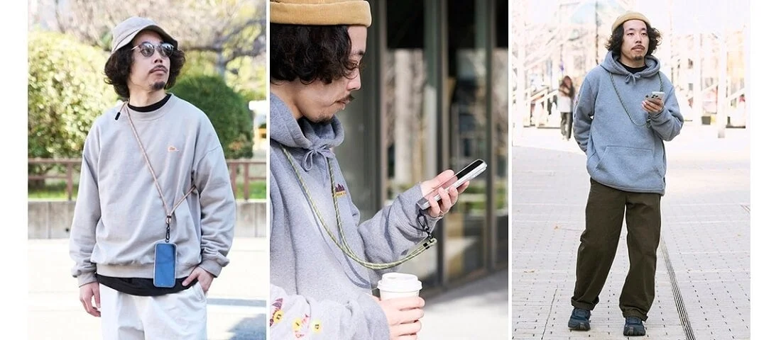 スマホショルダーを着用した男性のカジュアルファッション