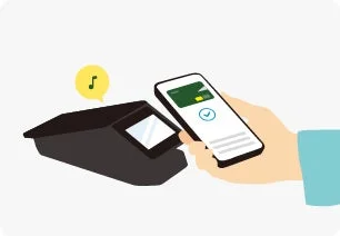 スマートフォンを決済端末にかざし、キャッシュレス決済を行っている様子。