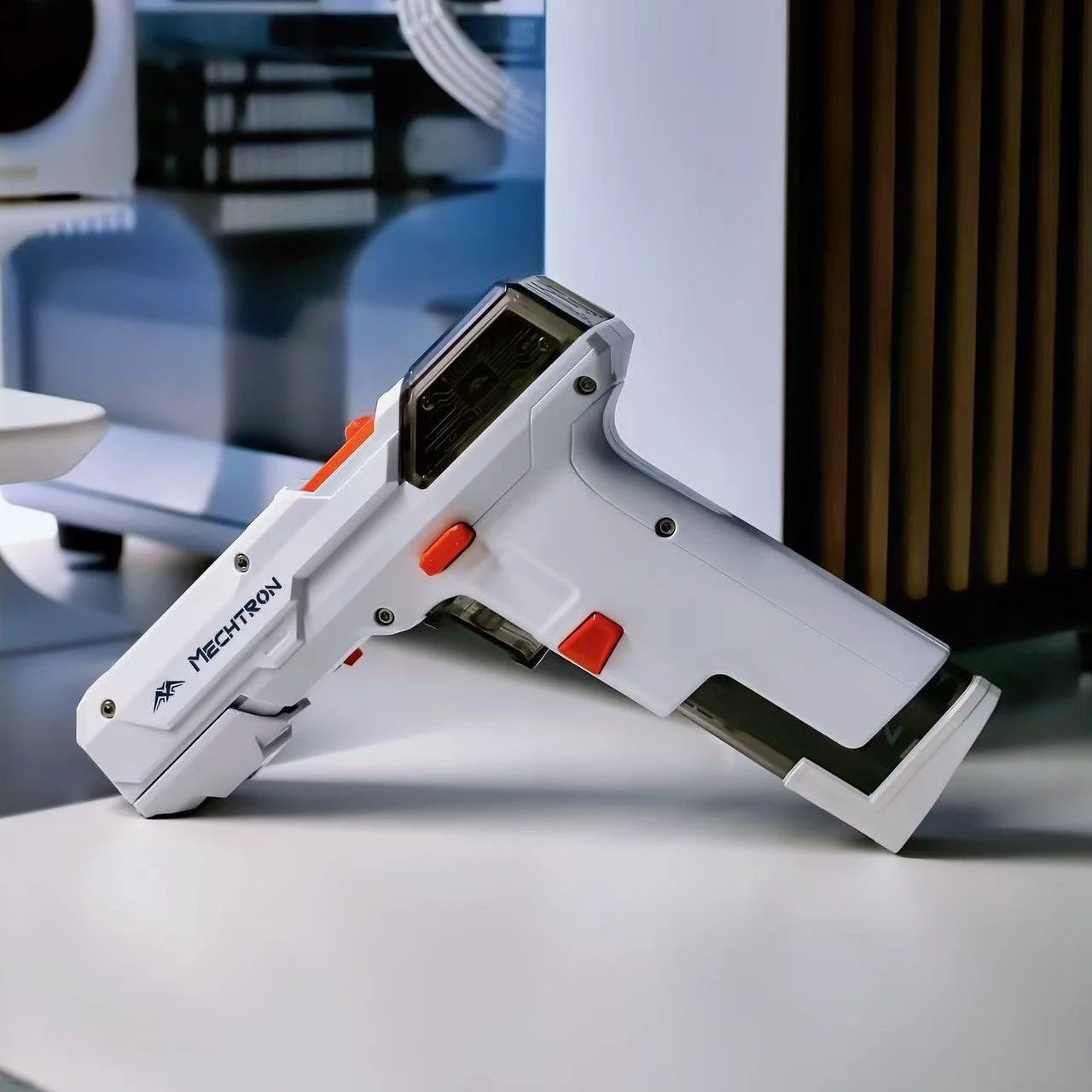 白とオレンジの未来的なデバイス