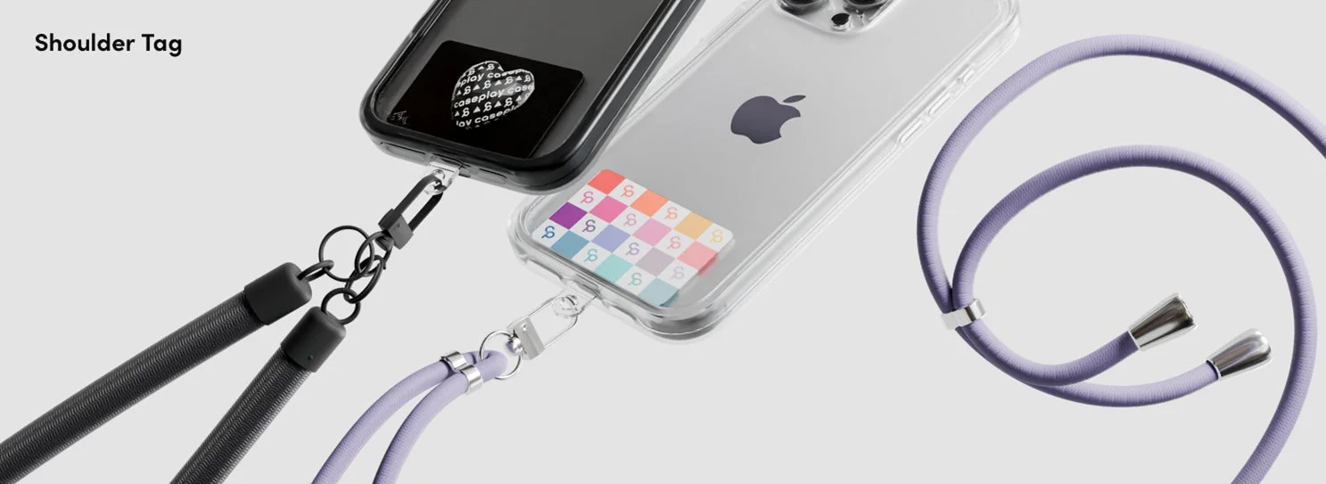 2台のスマートフォンに装着されたショルダーストラップと、スマホケースに挟まれたデザインカード