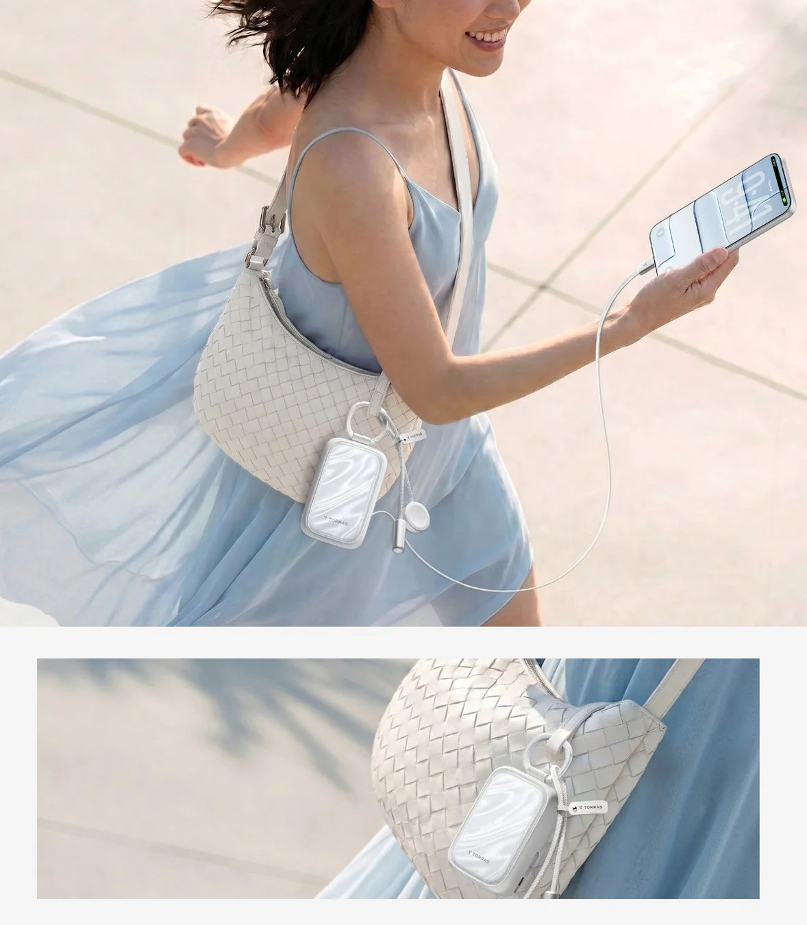 女性がバッグにバッテリーを付けてスマホ充電