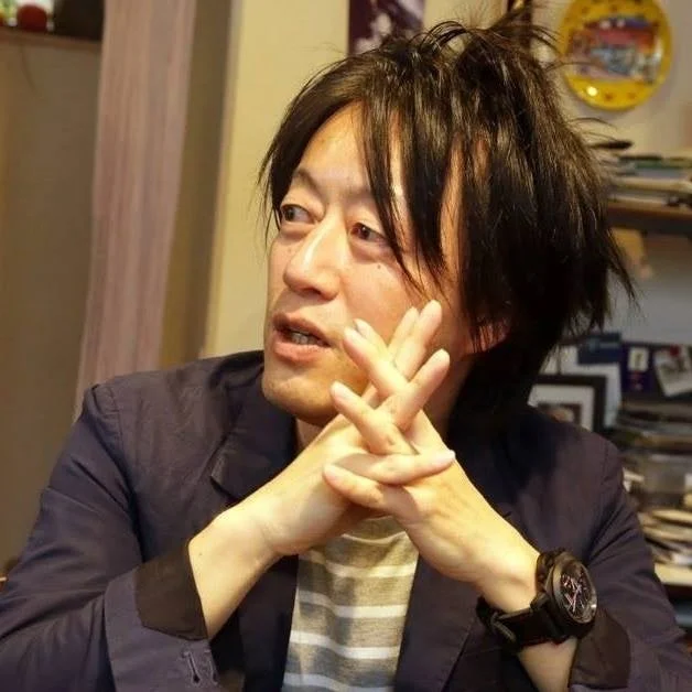 土方久明氏